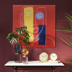 Obraz Szklany Twarz 100x100 Cm Czerwone Tło
